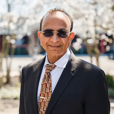 Dr. Mohinder Garg, Diplomate in Implant Dentistry, at MG Dental Associates