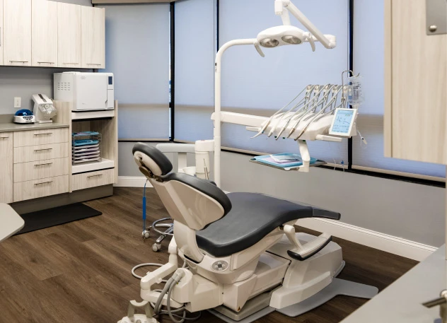 A hallway and treatment rooms at MG Dental Associates